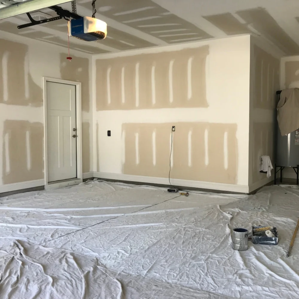 Garage drywall taped and mudded for a smooth paint-ready finish
